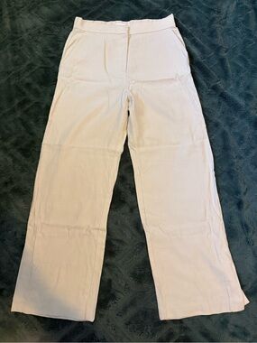 Tan high-waisted trousers with a relaxed fit. Size: 10 #highwaisted #trousers